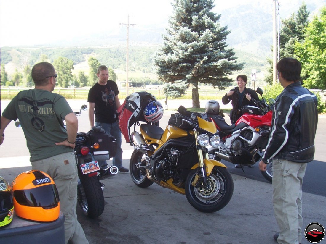 Motorcycles getting gas at the Mountain Green Sinclair Station