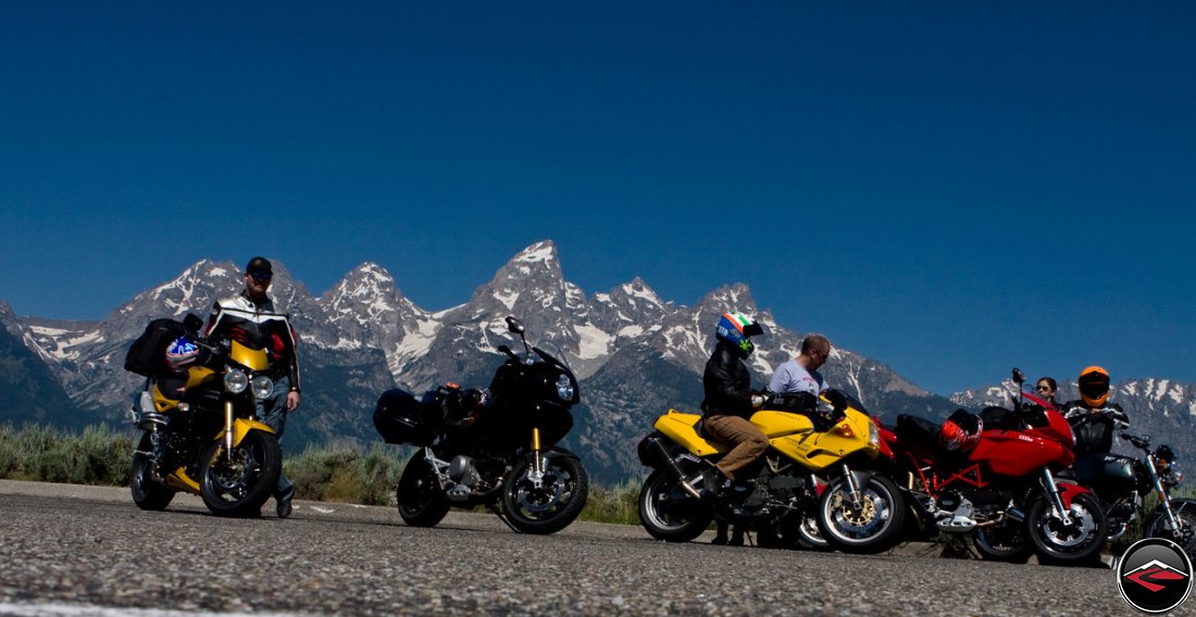 Motorcycles parked in front of The Big Breasts or Grand Tetons