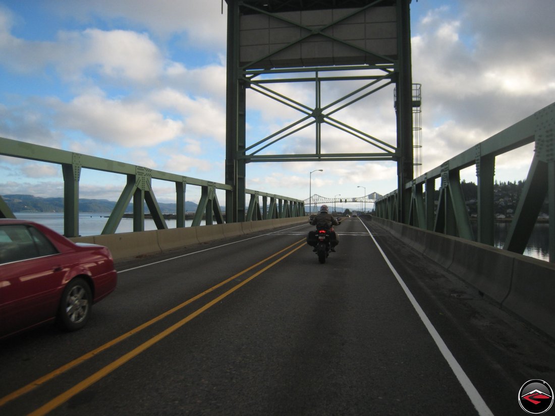Motorcyclist riding into Astoria, Oregon