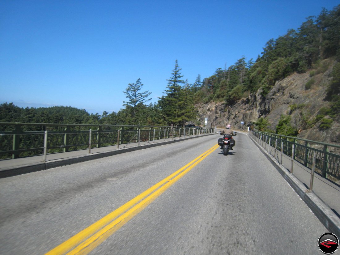 motorcyle riding over deception pass bridge