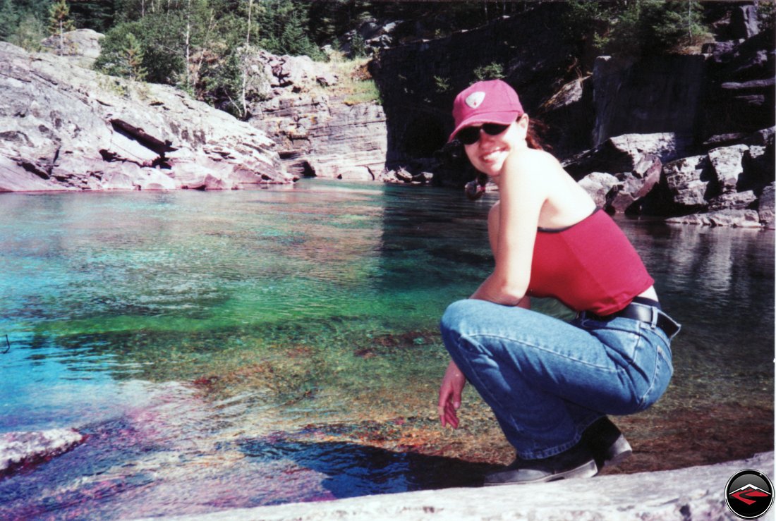 sexy girl Kris on the water of avalanche river in Glacier National Park