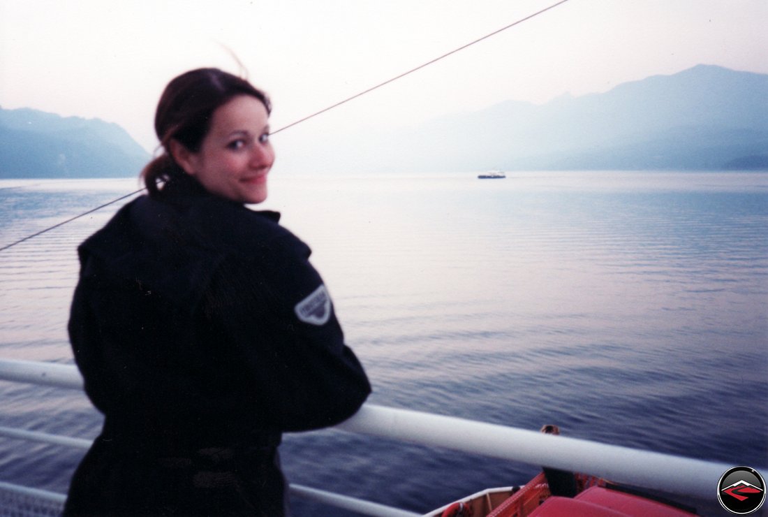 pretty, sexy girl kris standing on a ferry boat