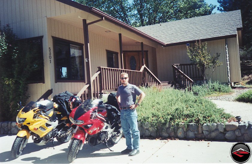 Honda VTR1000 Superhawk and Suzuki TL1000S parked in a driveway