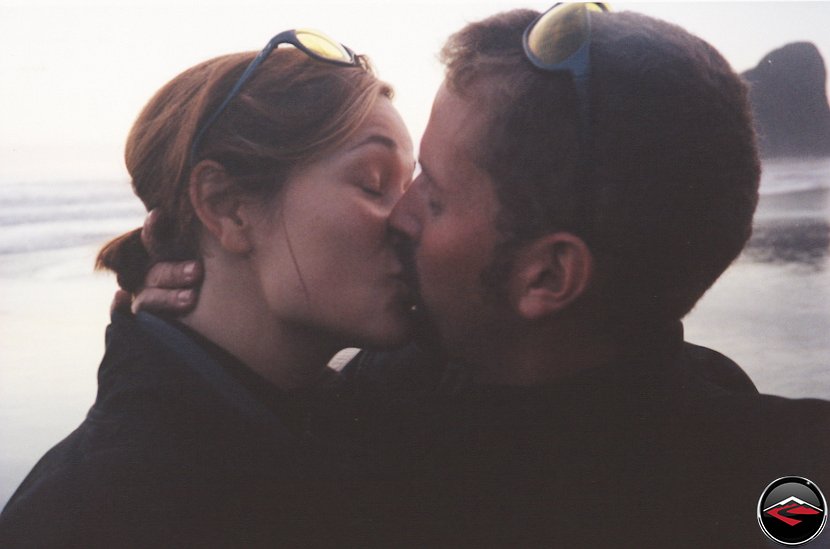 dave and kris kissing on the beach