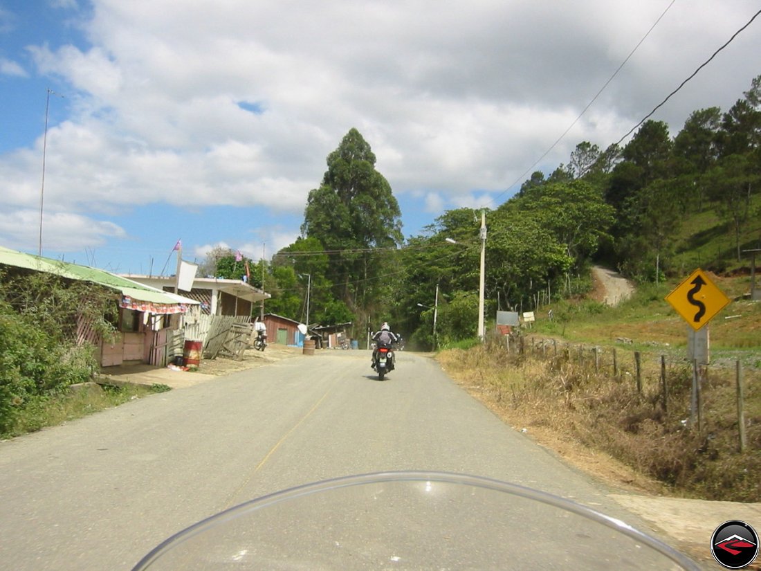 Motorcycles riding through gravel patches in the Dominican Republic