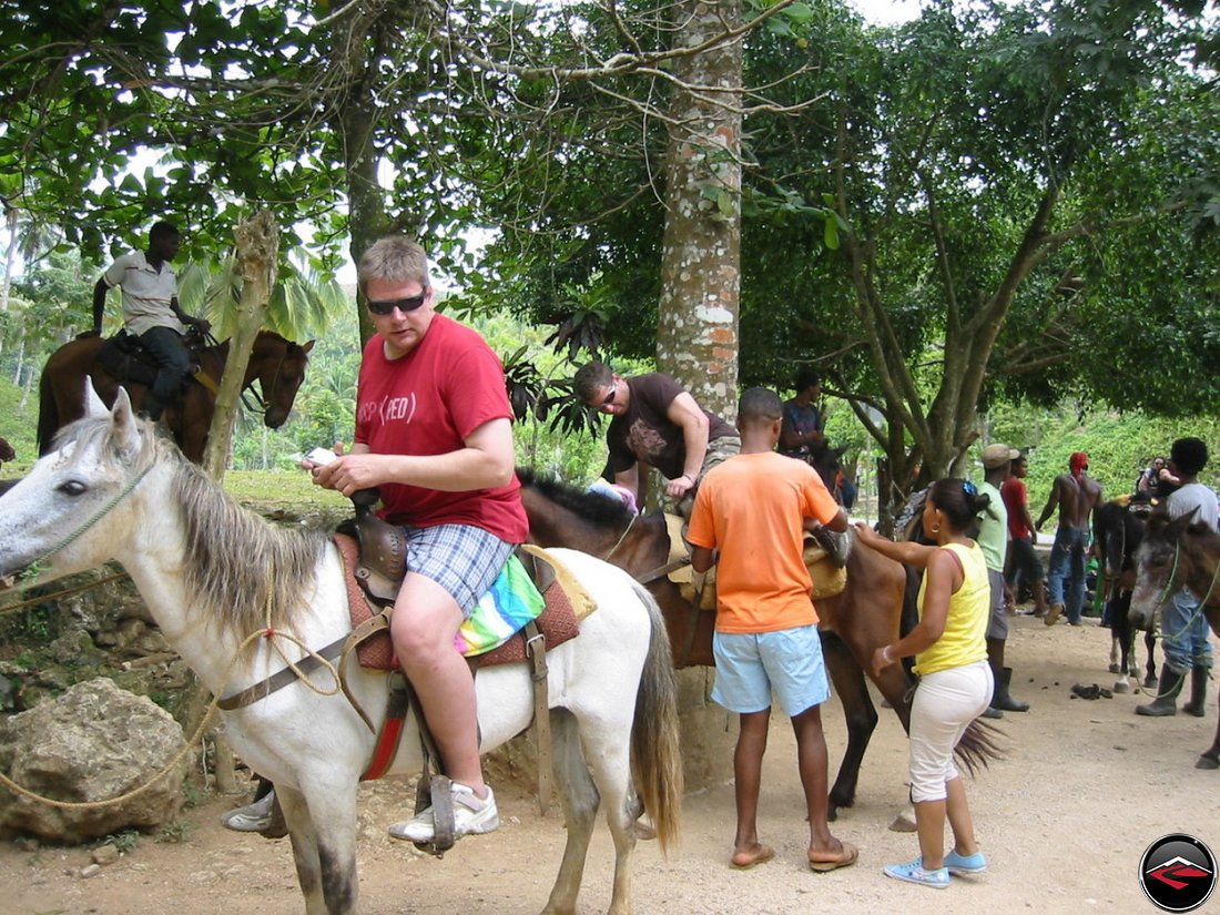 man on a horse at Cascada El Limon Dominican Republic