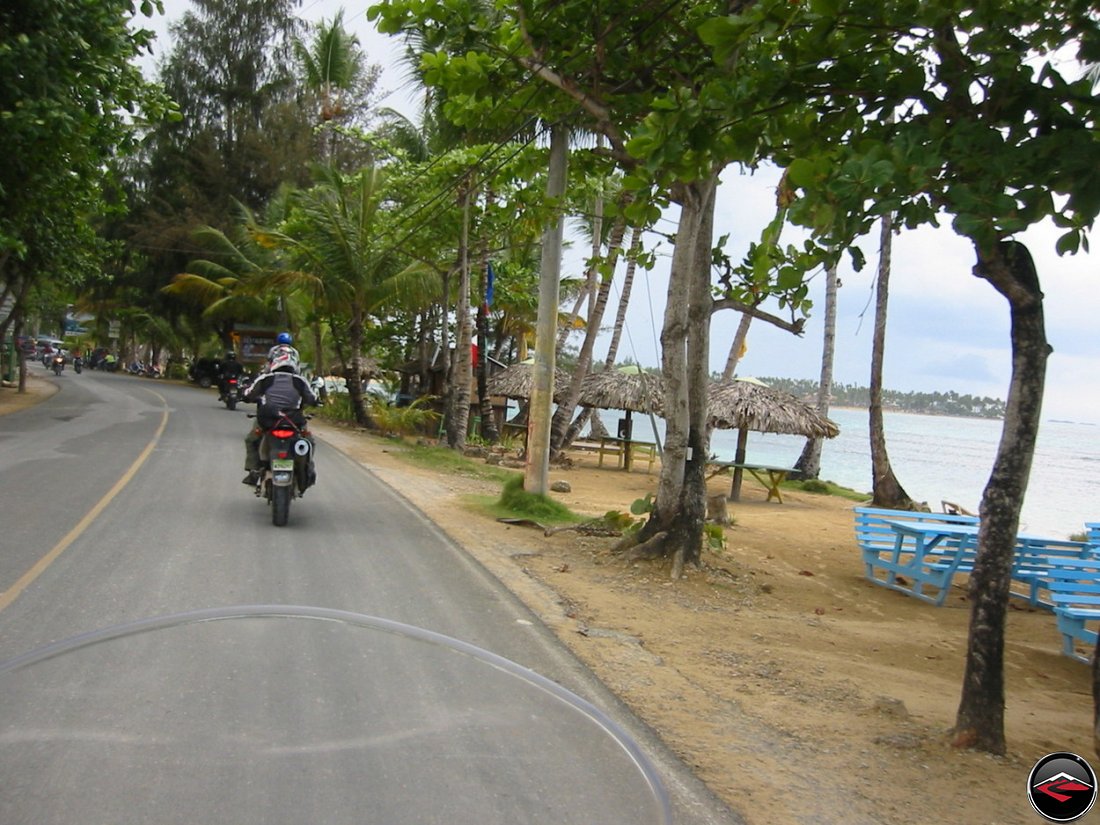 riding a motorcycle along the beach in Las Terrenas El Limon Samana Dominican Republic