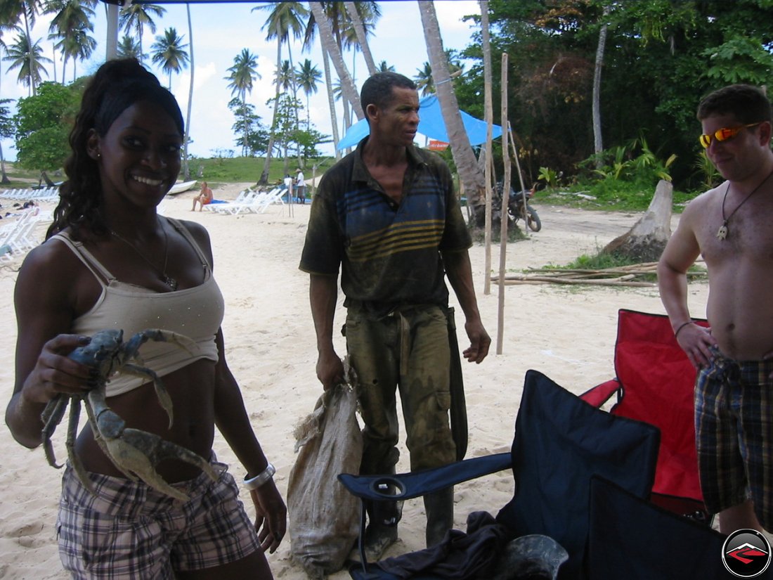 Woman selling a crab at playa rincon dominican republic
