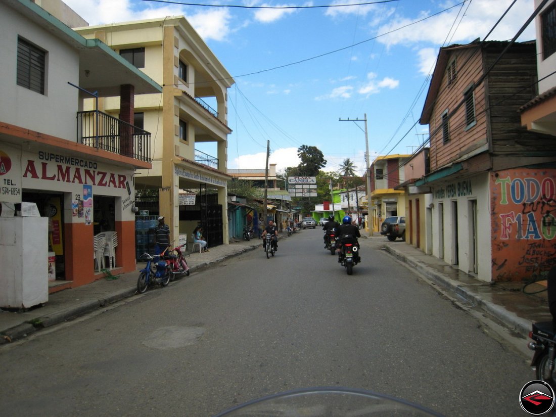 Motorcycles riding through downtown Jarabacoa