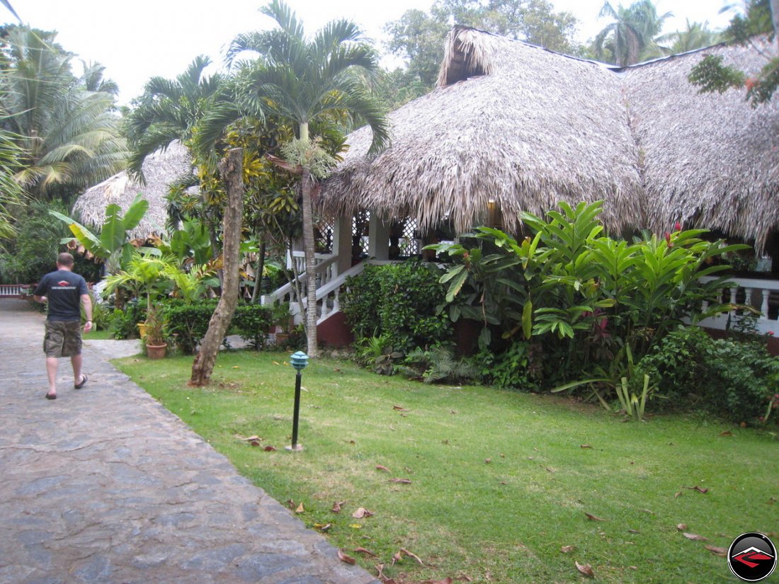 man walking into caribbean Bar and Restaurant