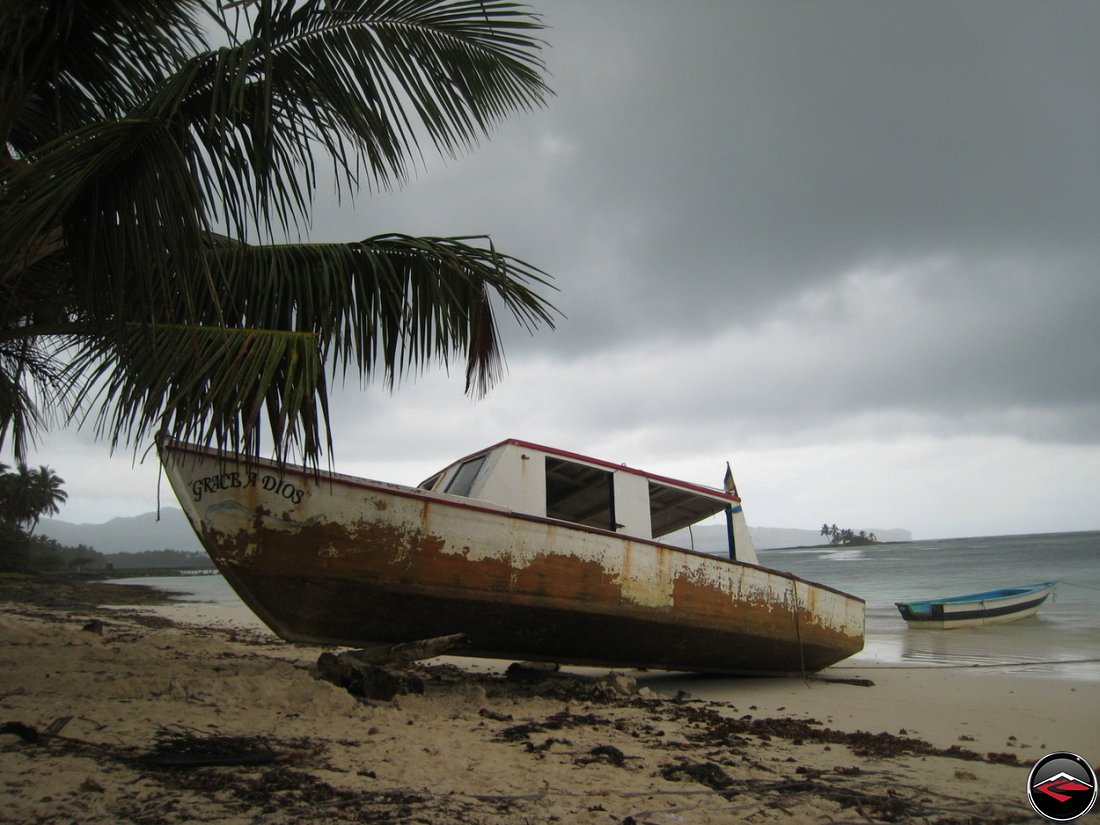 Grace A Dios fishing boat stranded on a caribbean beach