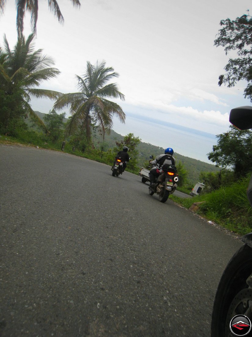 motorcycles stuck behind Slow moving traffic in El Limon Samana Dominican Republic