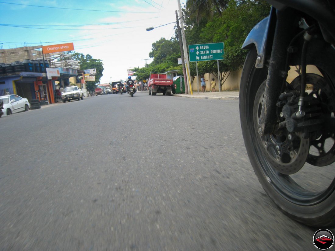 riding into town with lots of signs nagua, santo domingo, sanchez