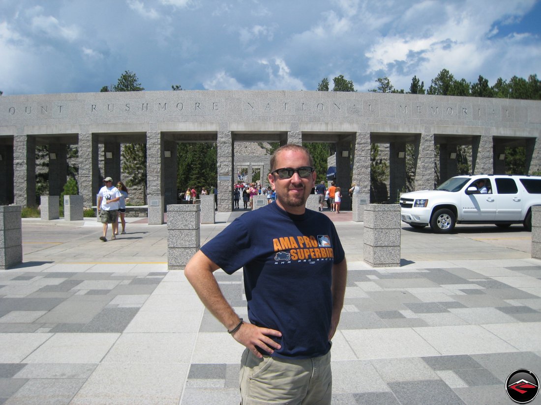 Staning in front of the Mount Rushmore National Monument Entrance