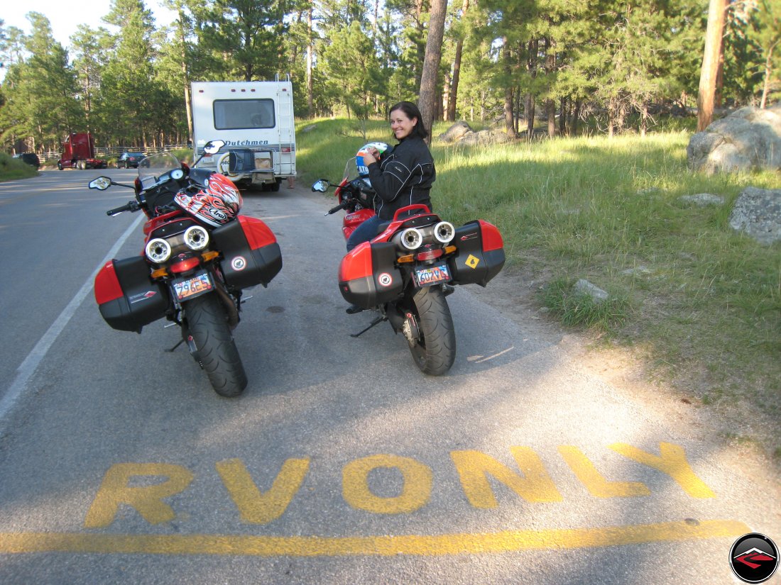 Two motorcycles parked in RV Only Parking