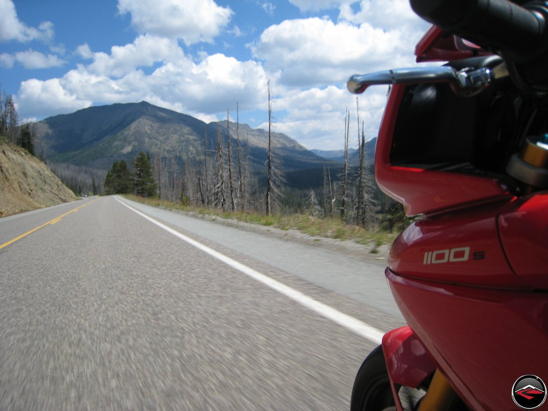 Ducati Multistrada riding out the east gate of Yellowstone National Park