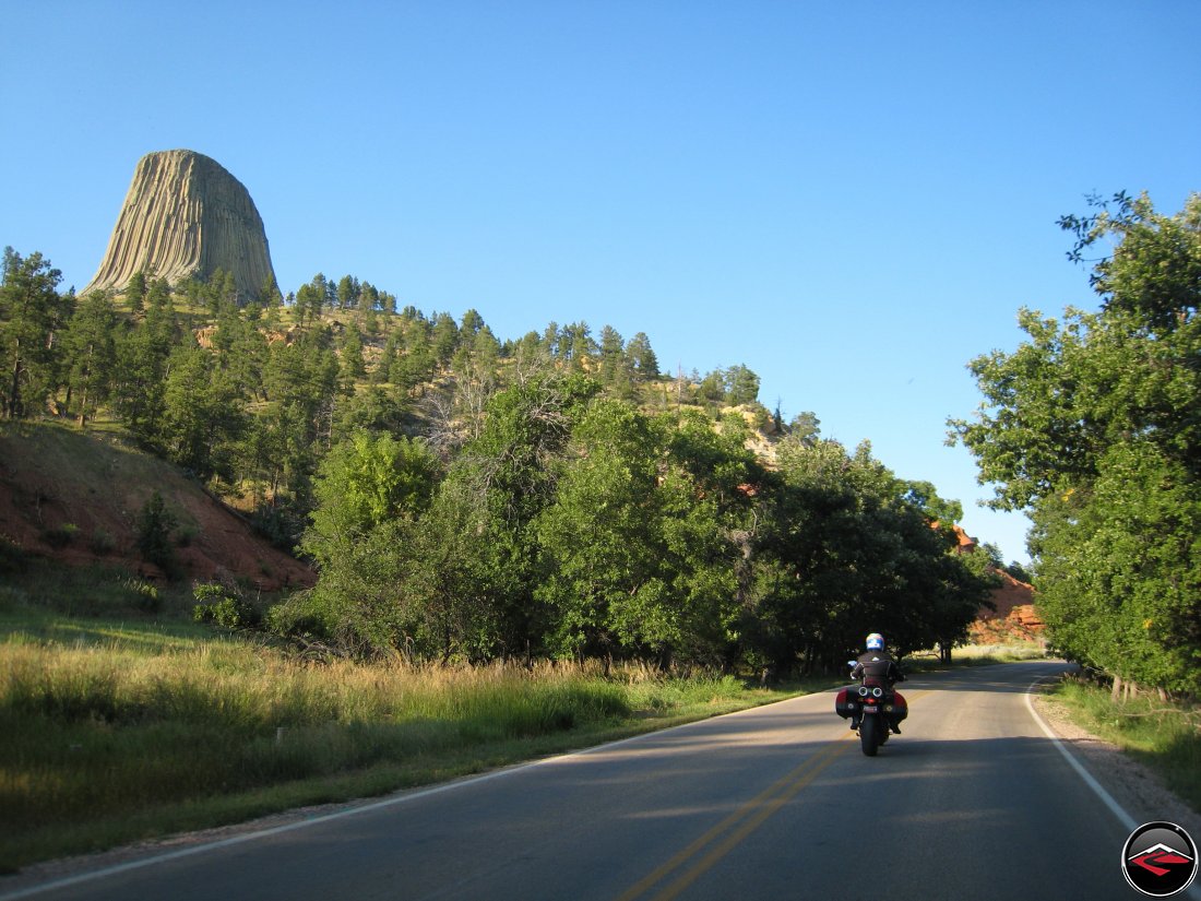 Ducati Multistrada motorcycle riding around Devils Tower at Sunset