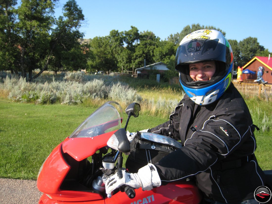 Pretty girl ridng a Ducati Multistrada