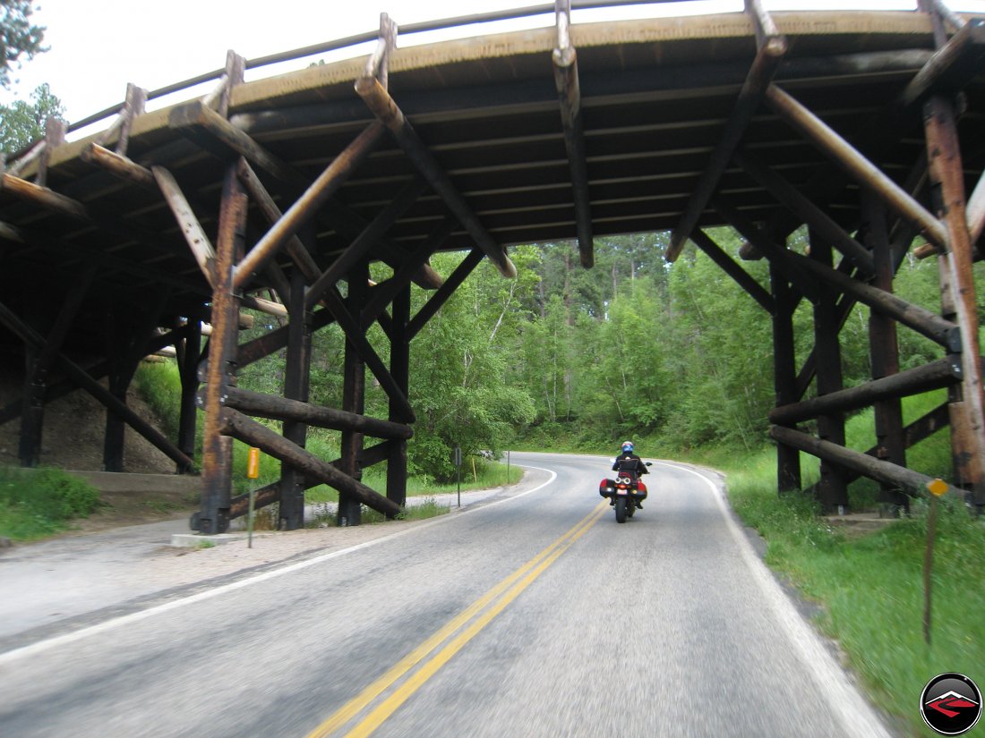 Ducati Multistrada Motorcycle Riding through the Pigtail Bridges on the Norbeck Scenic Byway in South Dakota