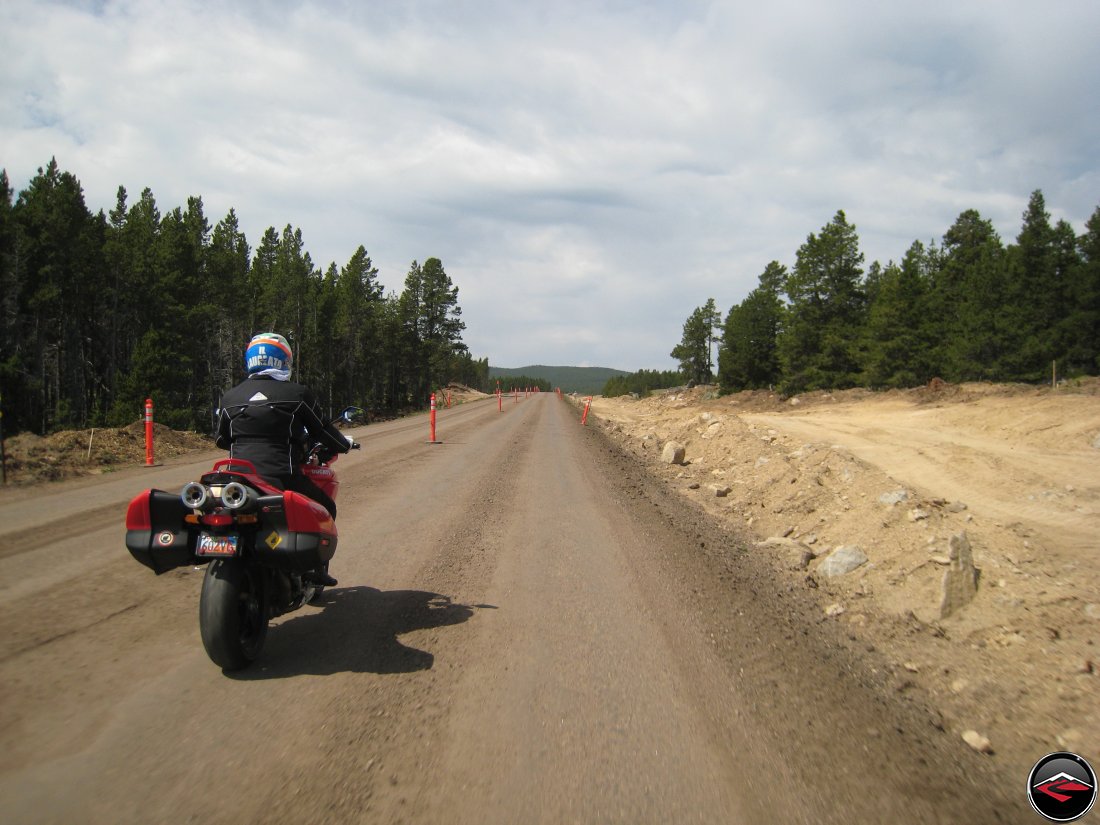 Ducati Mulitistrada Motorcycle riding through road construction in the Big Horn Mountains