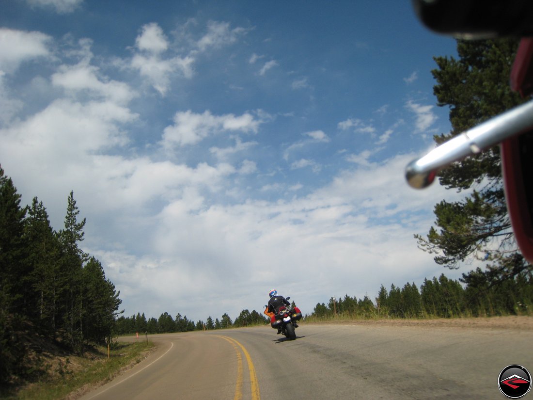 Ducati Mulitistrada Motorcycle riding through sweeping corners in the Big Horn Mountains