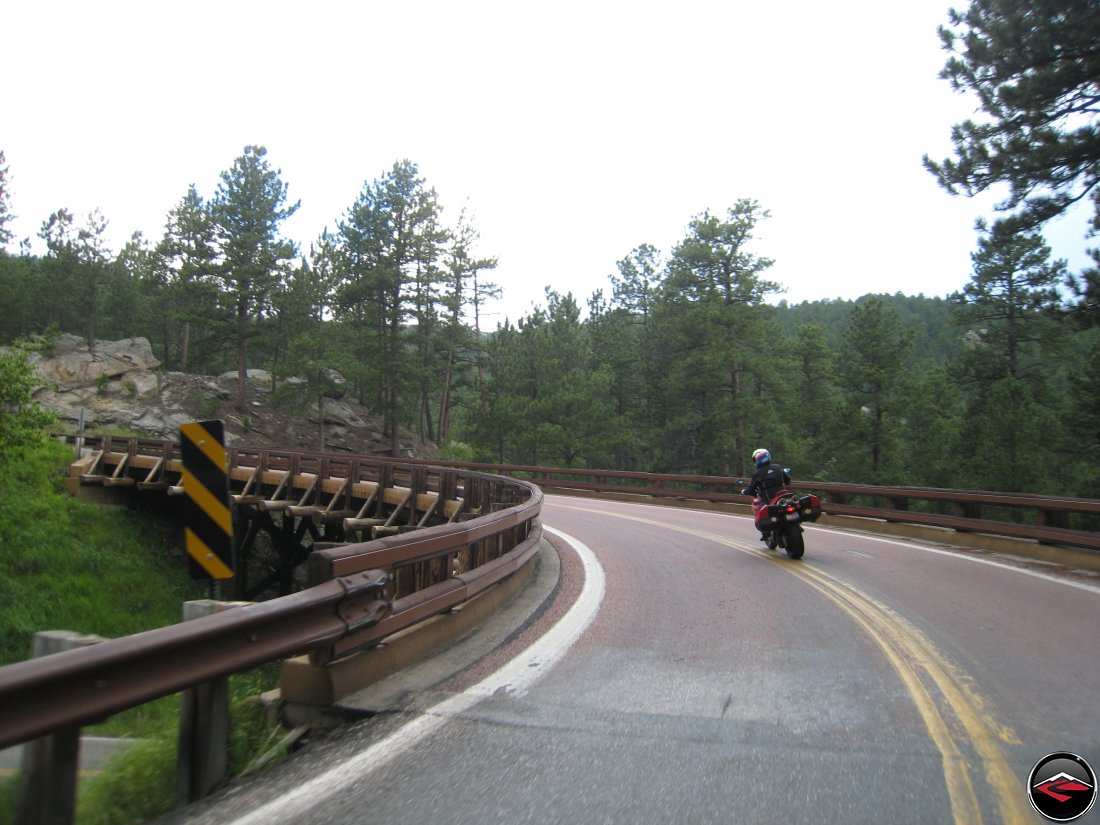 Ducati Multistrada Motorcycle Riding through the Pigtail Bridges on the Norbeck Scenic Byway in South Dakota