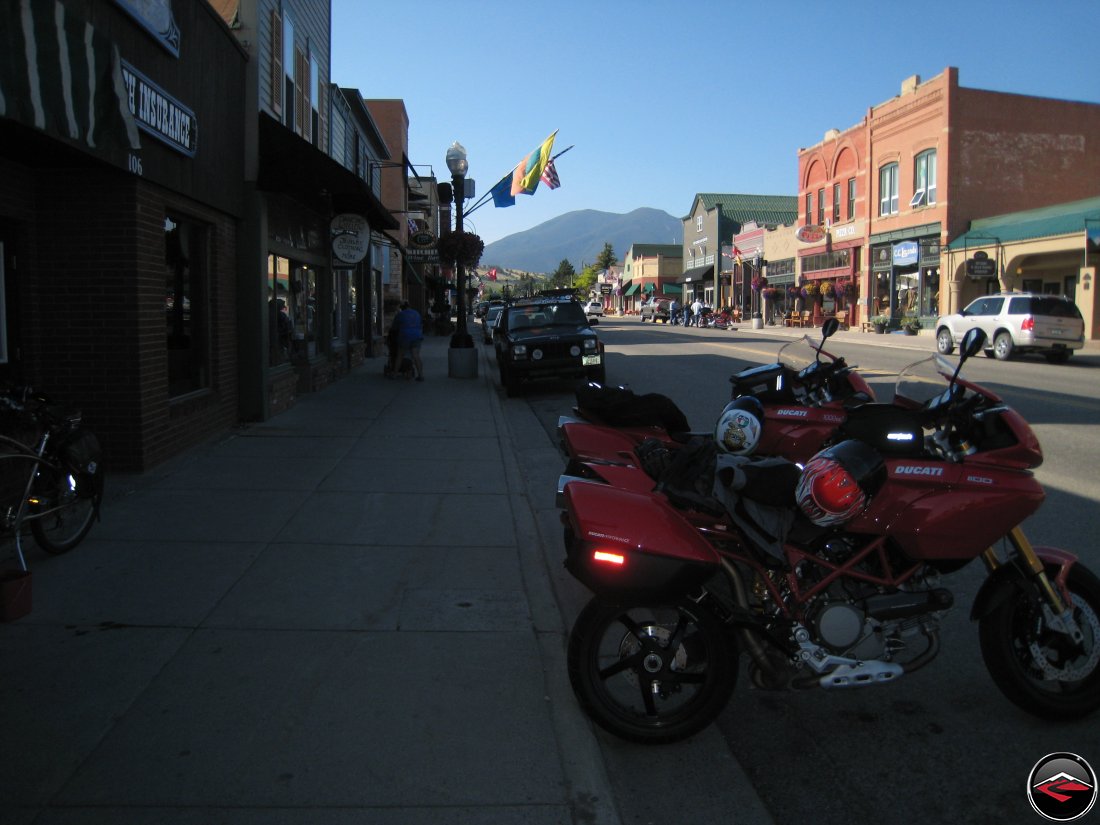 Two Ducati Multistrada motorcycles parked on mainstreet Red Lodge, Montana