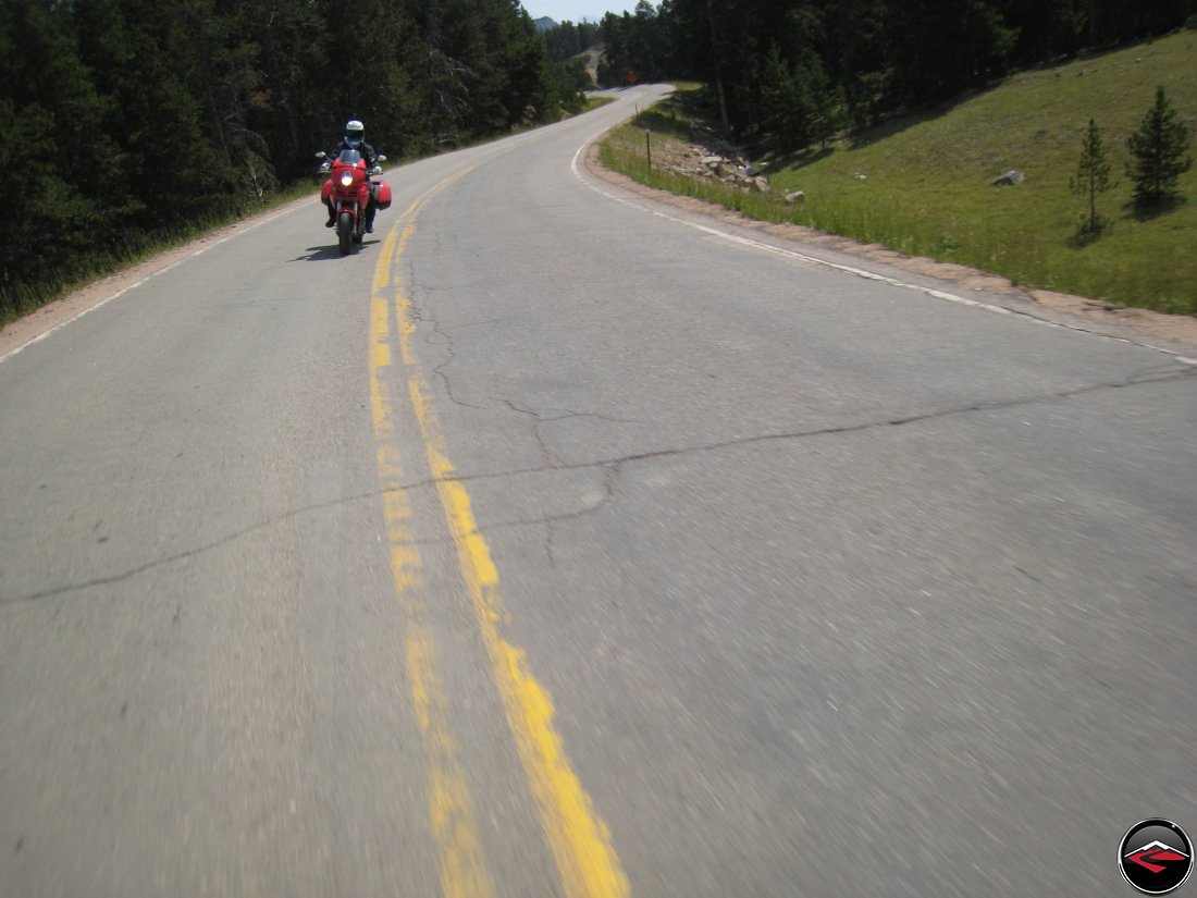 Ducati Mulitistrada Motorcycle riding through sweeping corners in the Big Horn Mountains