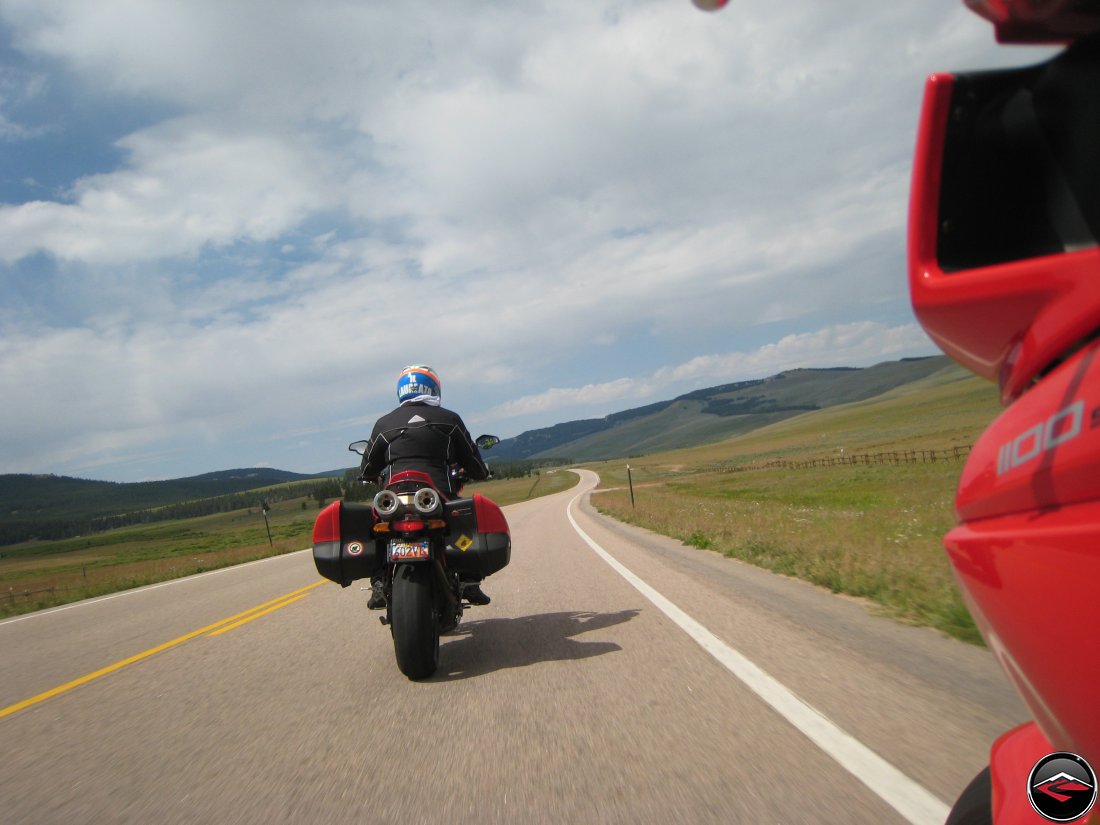 Ducati Mulitistrada Motorcycle riding through sweeping corners in the Big Horn Mountains