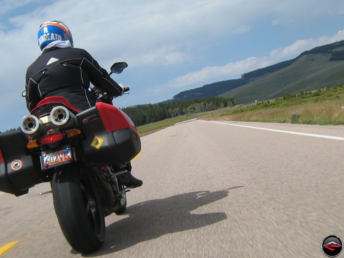 Ducati Mulitistrada Motorcycle riding through sweeping corners in the Big Horn Mountains