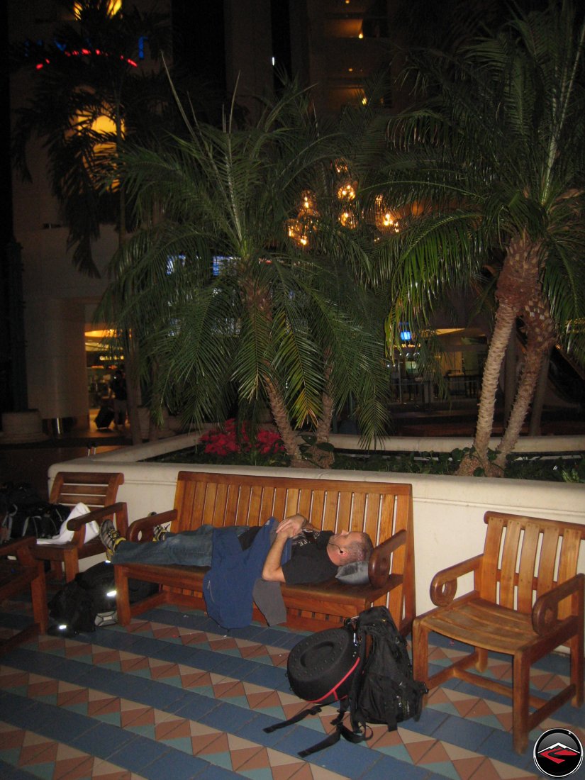 Sleeping on a bench in the airport