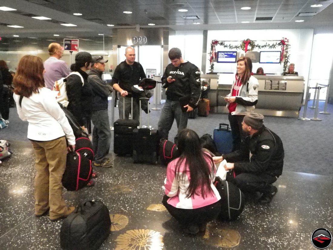 Group gathering together in the very, very cold Miami airport