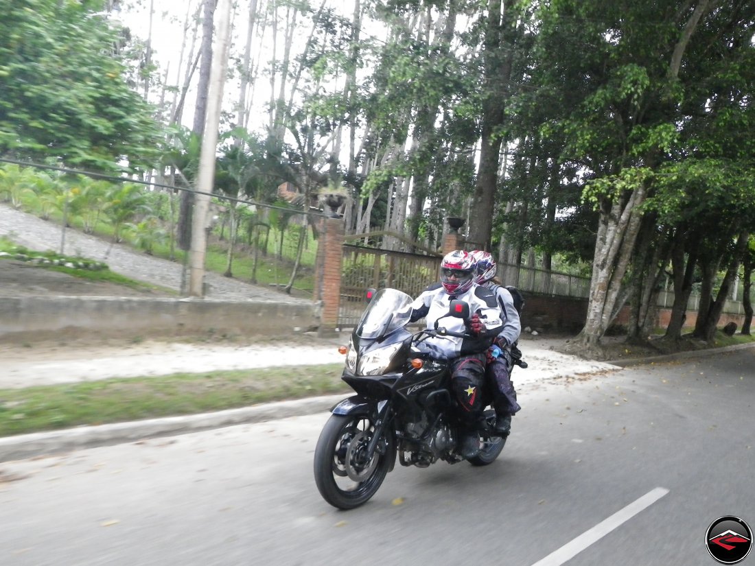 Gary and Phylis riding two-up on a Suzuki V-Strom 650 in Jarabacoa, Dominican Republic