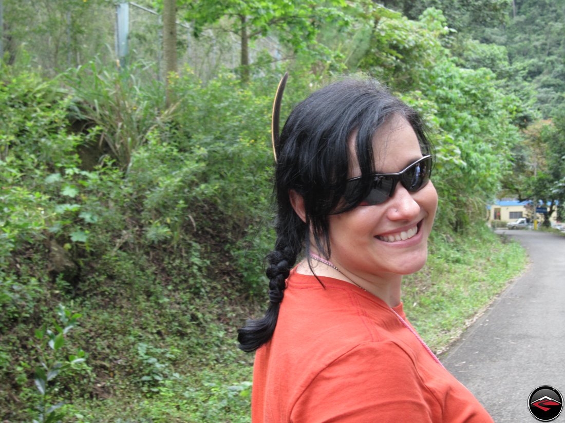 Pretty girl with a feather in her hair