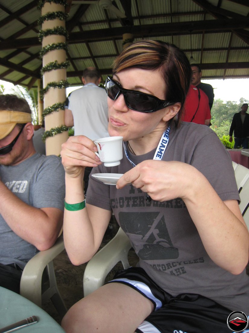 Pretty girl driking coffee at Mi Vista Mountain Resort in the Dominican Republic