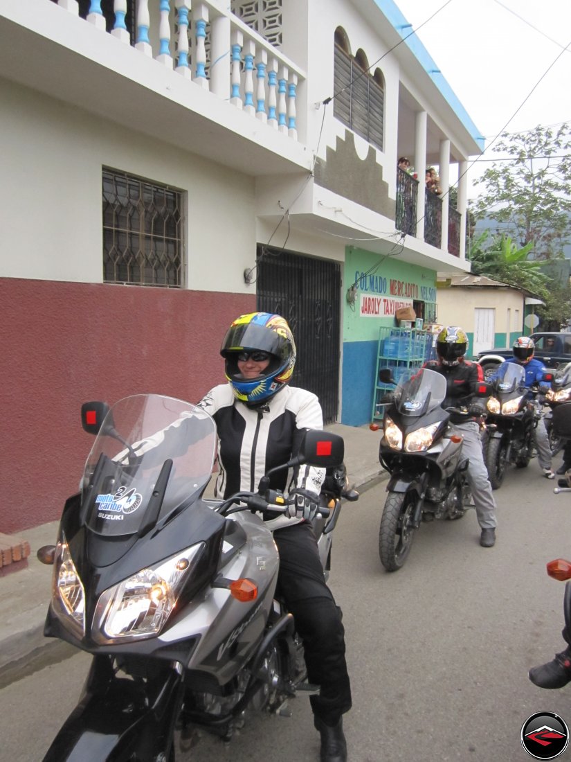 Riding motorcycles through the narrow, conjested streets of Jarabacoa, Dominican Republic