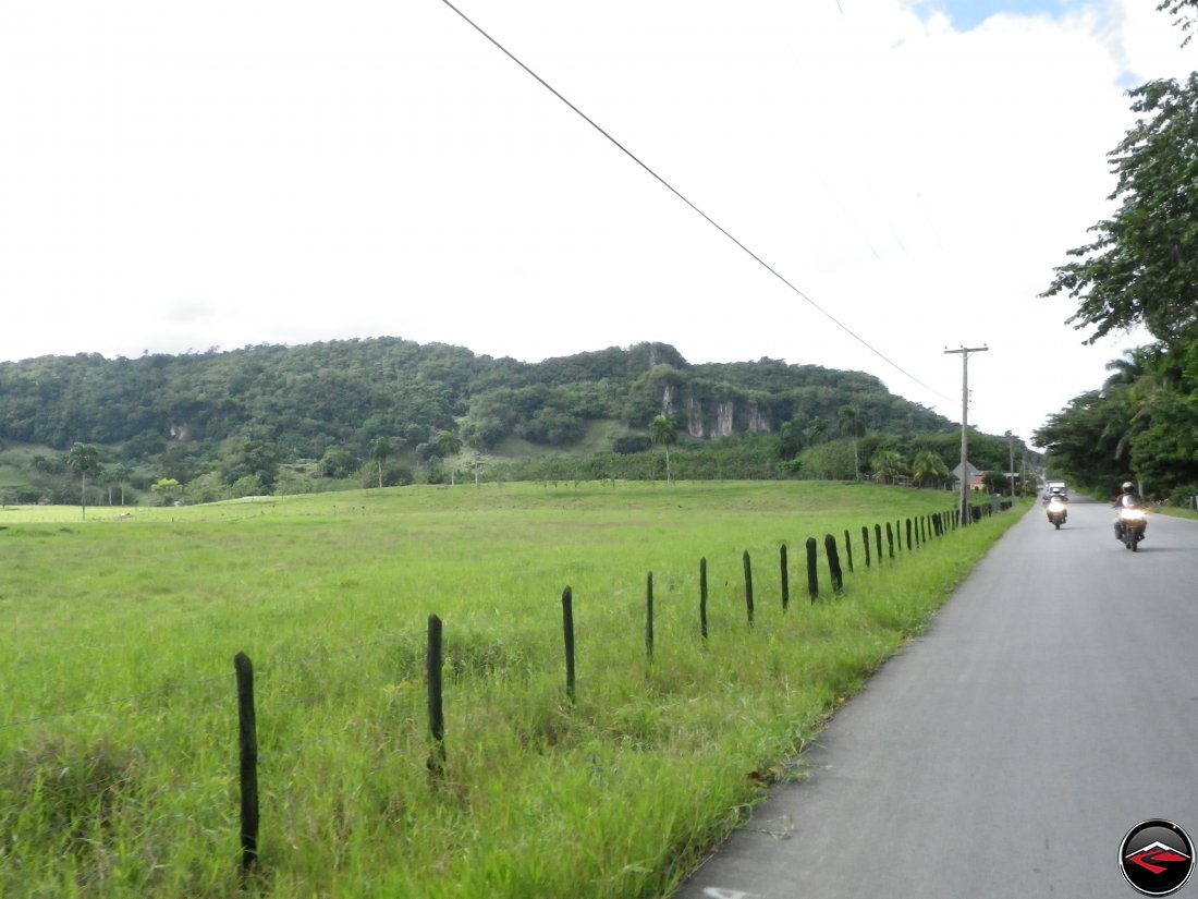 riding motorcycles along Highway 5 in the Dominican Republic