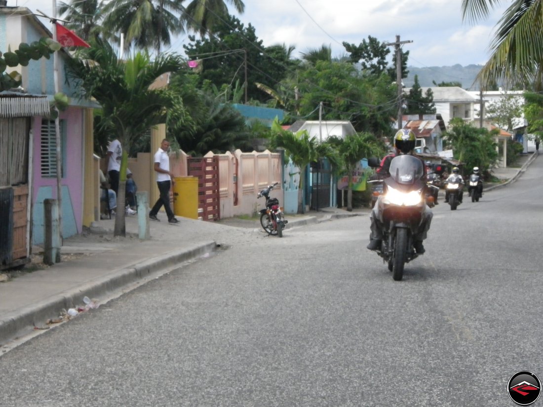 Riding motorcycles on Highway 5 through Gaspar Hernandez Dominican Republic