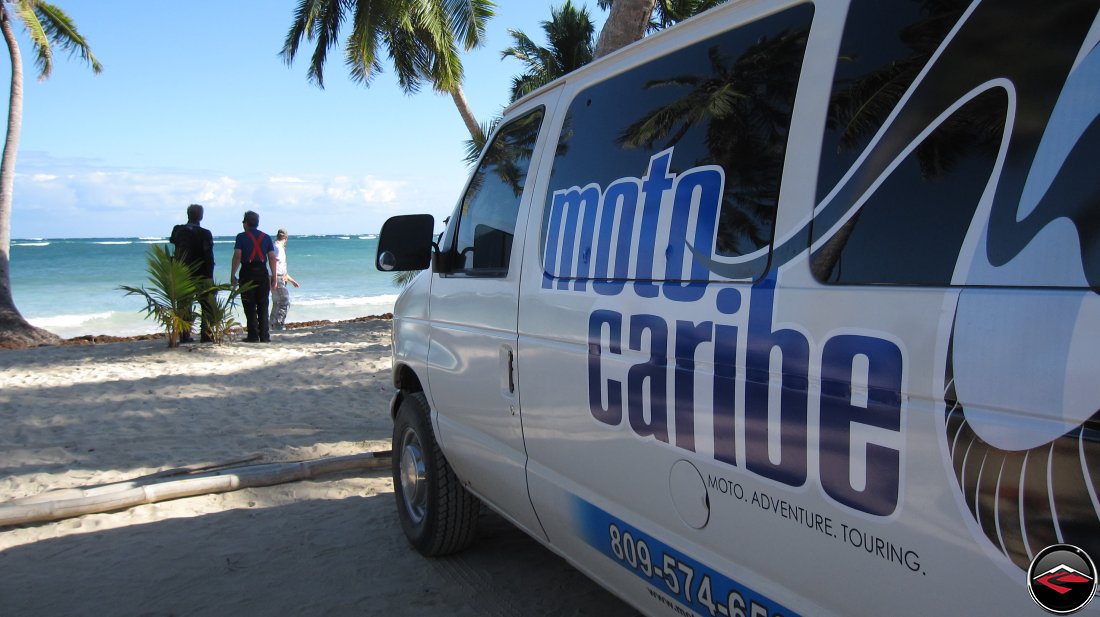 MotoCaribe Van parked on the beach in the Dominican Republic