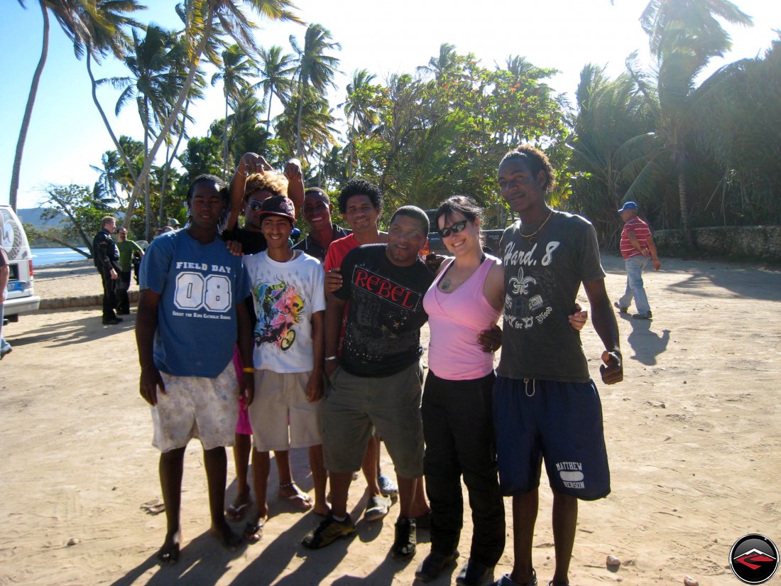 Pretty girl surrounded by Dominican Republic men