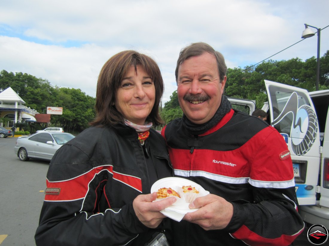 man and woman sharing a plate of cookies