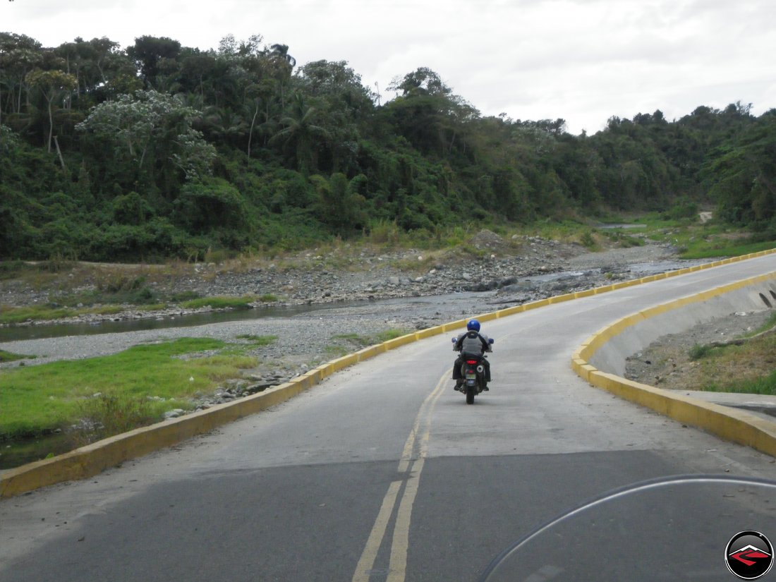 Motorcycle crossing a bridge in the Dominican Republic