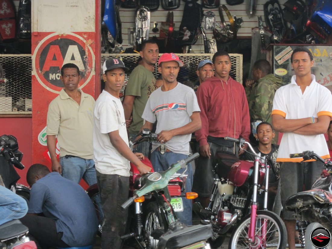 Dominican Republic men being impressed by girls riding motorcycles