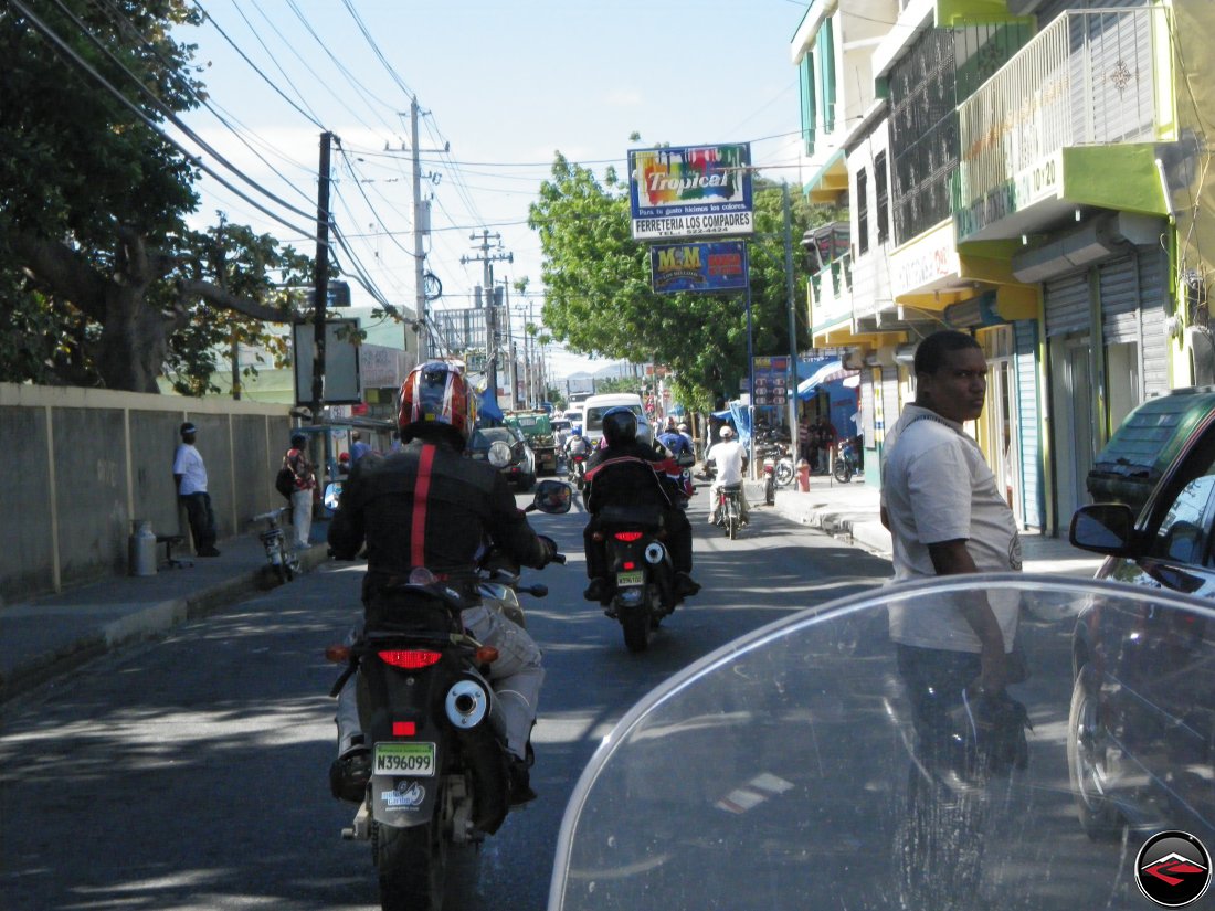 heavy traffic in a small town in the dominican republic, ferreteria los compadres