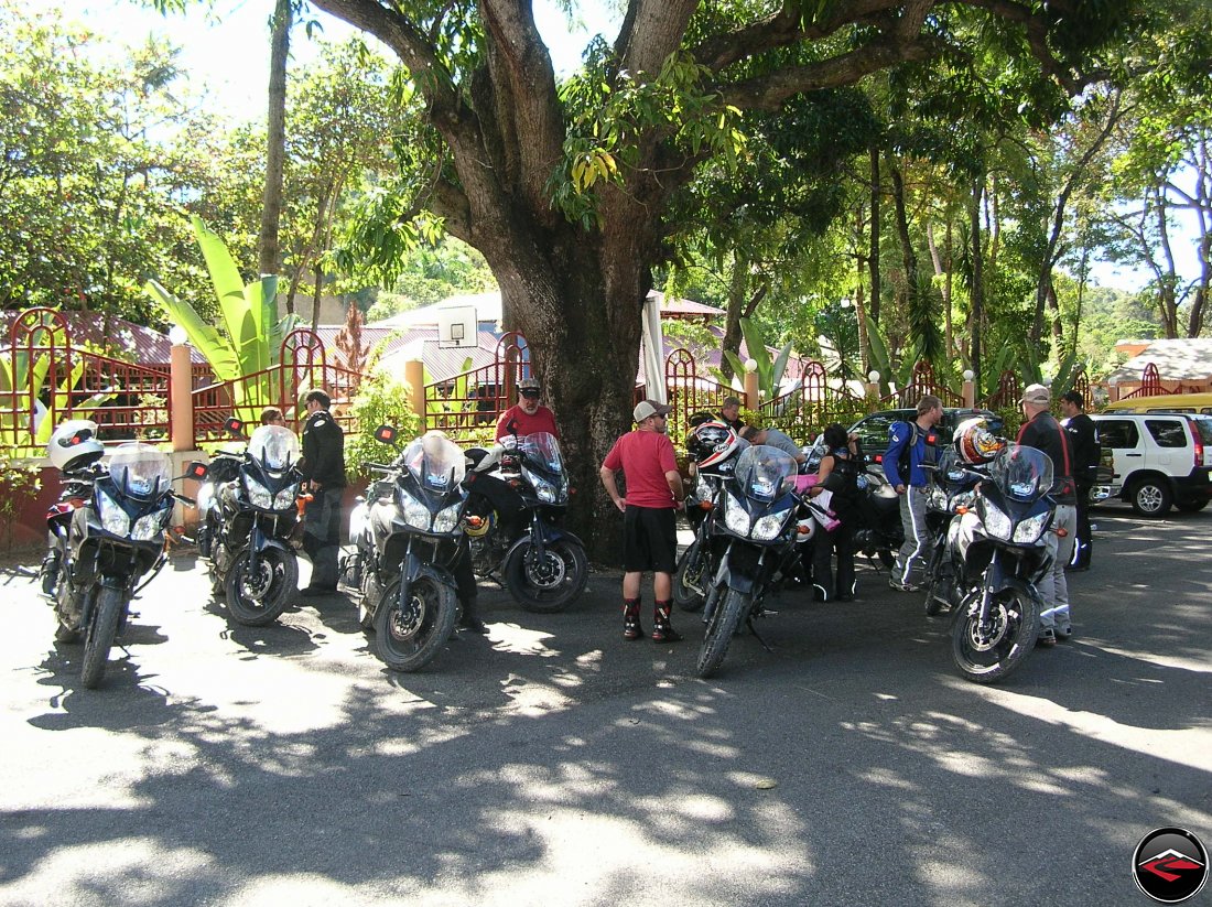 motorcycles parked in the shade in the caribbean