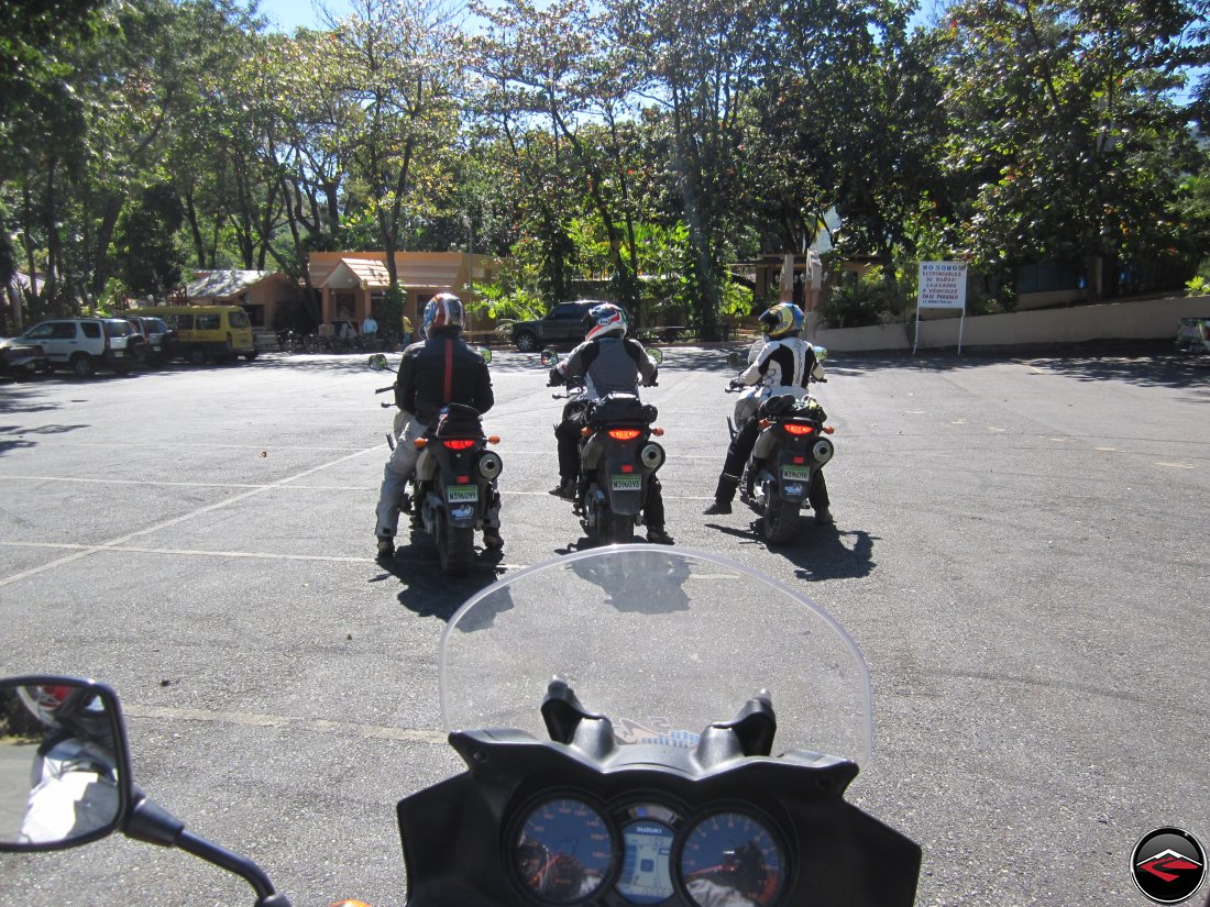 three motorcycles lined up, ready to ride