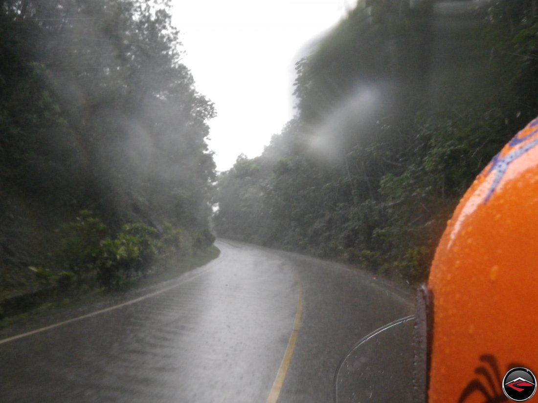 riding a motorcycle in heavy rain