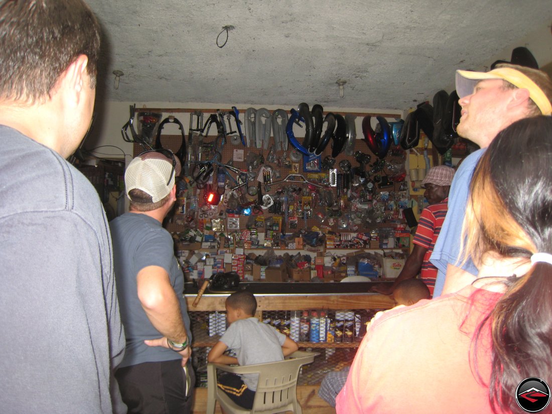 shopping for motorcycle parts at a road-side motorcycle shop in the dominican republic caribbean island