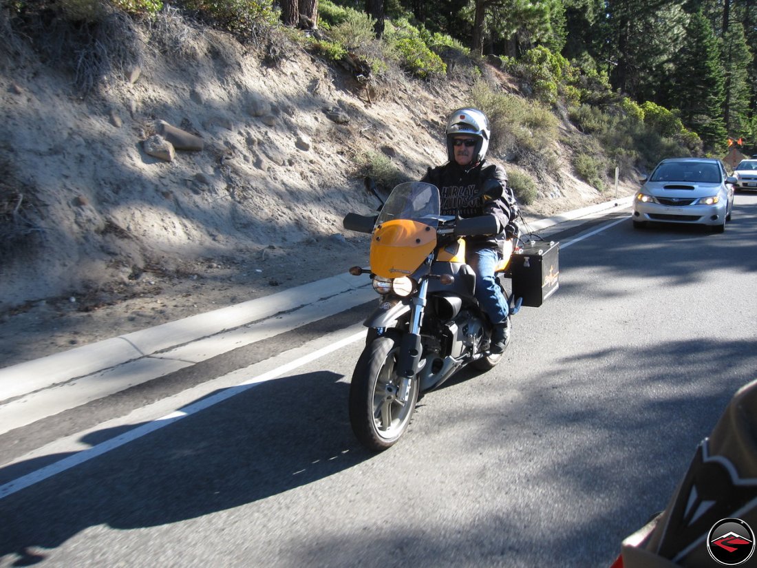 Tom Riding his Buell Ulysses, fit with Pirelli Sync tires and Happy Trails saddlebags, in traffic along California Highway 28, North Lake Blvd, near Lake Tahoe.