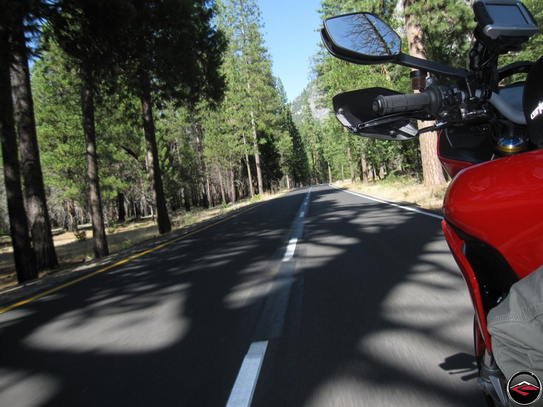 Riding a Ducati Multistrada 1200 Into the tree's in California Yosemite National Park along Southside Drive. Garmin Zumo 450 mounted to the handlebars.